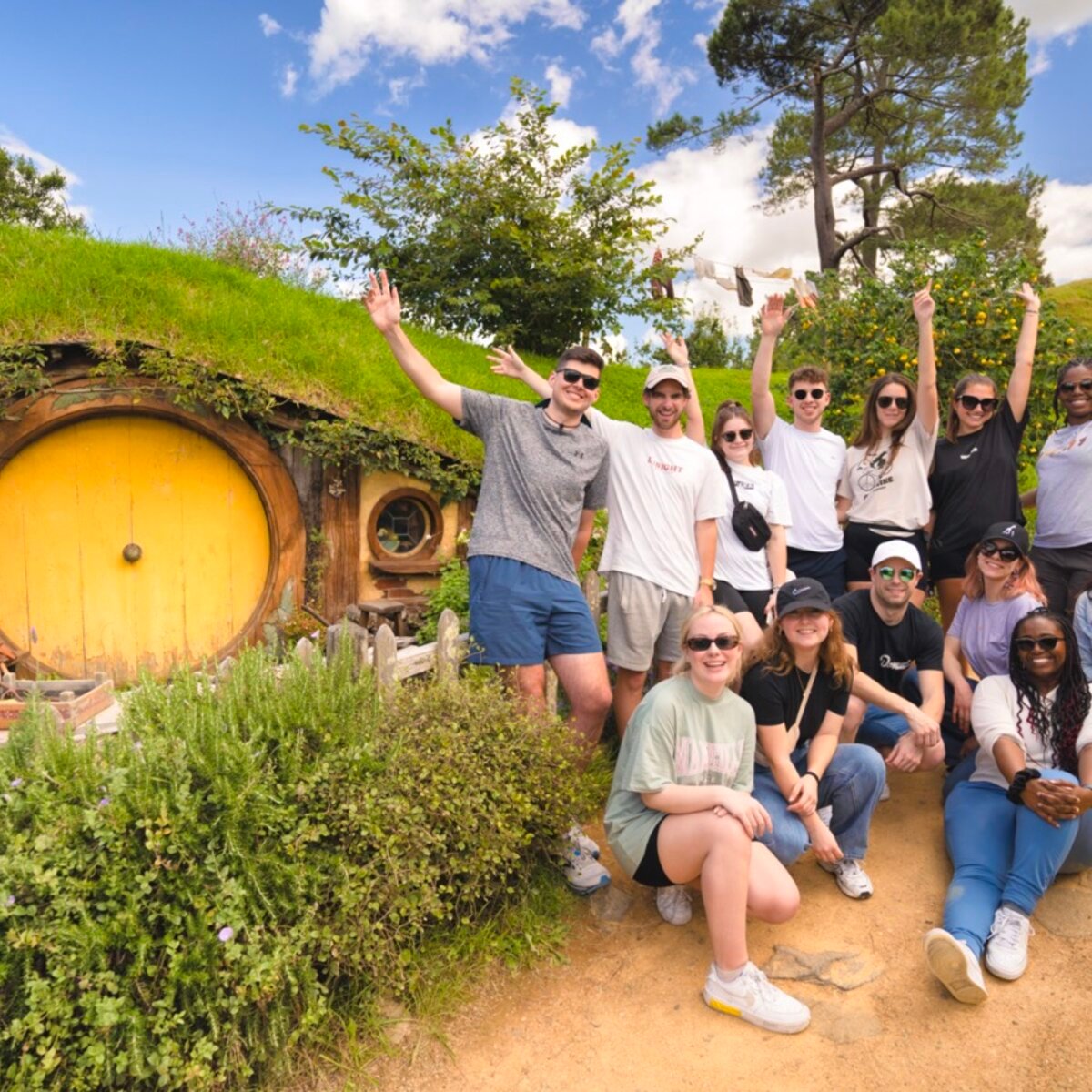 Group travellers in Hobbiton in New Zealand